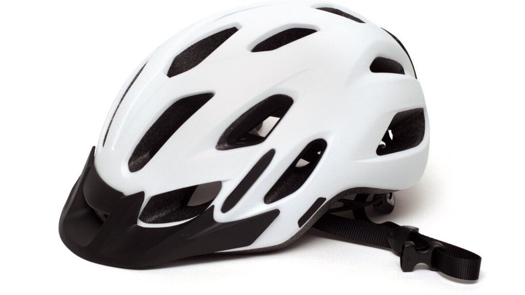 A generic white and black bicycle helmet on a plain background