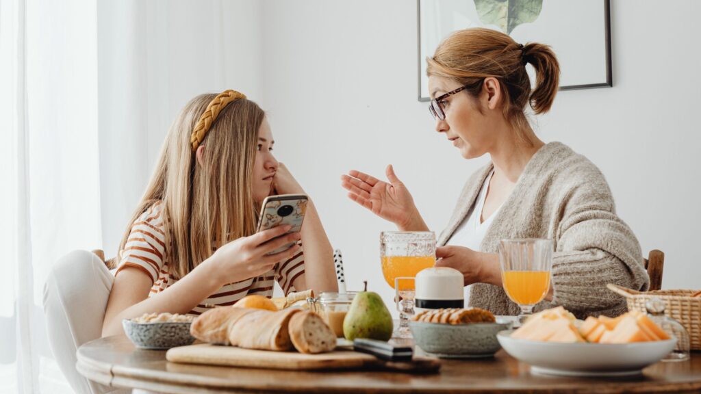 mom talking with teenager