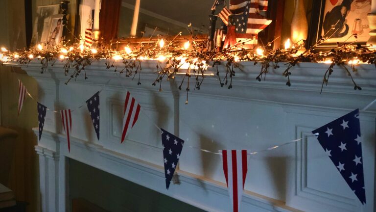 white and red flag on white wooden wall