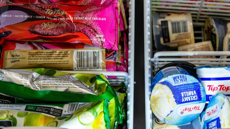 a refrigerator filled with lots of food and condiments