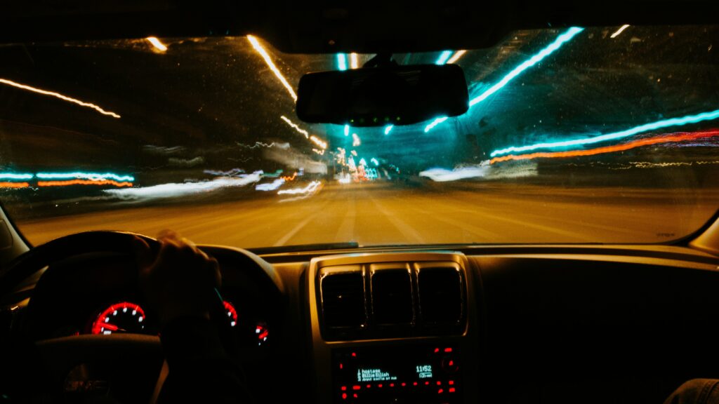 person driving car during night time