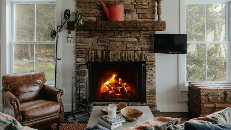 a living room filled with furniture and a fire place