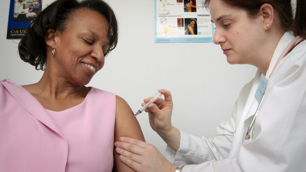 woman getting vaccine