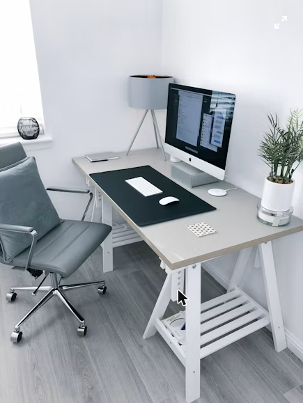 A tidy home desk setup, representing the kind of workspace where a thermal laminator might sit