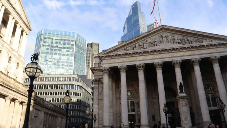 a building with columns and a flag