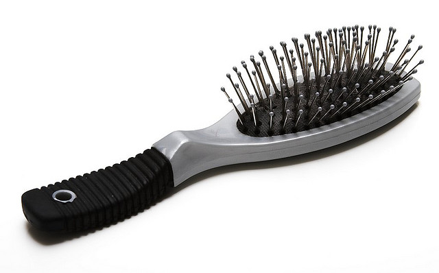 A hairbrush with metal bristles