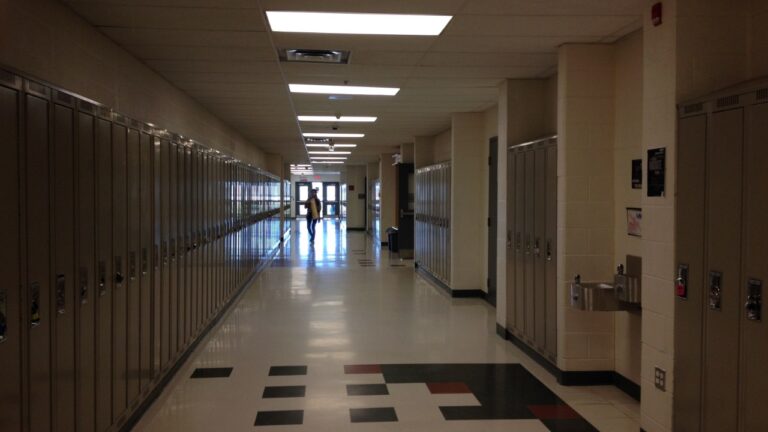 Empty school hallway with lockers